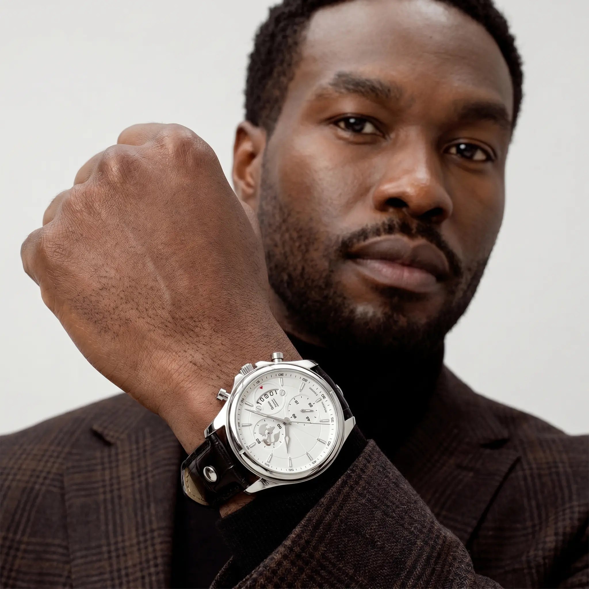 Lifestyle photo of the Meridian Ivory Steel men's watch
